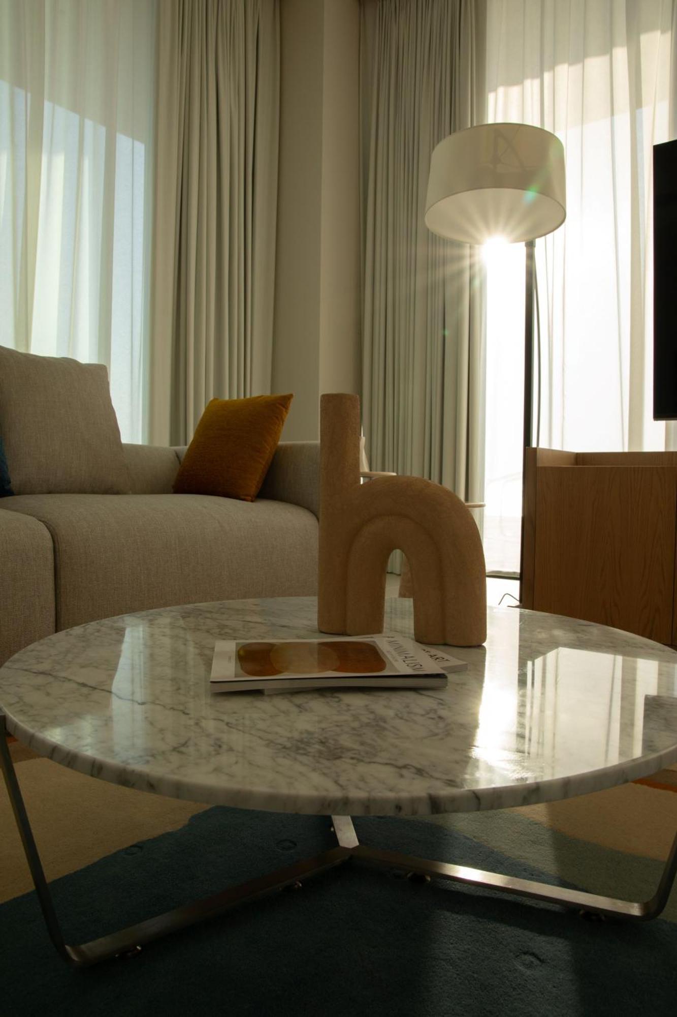 아지만 호텔 외부 사진 A 3D rendering of a living room